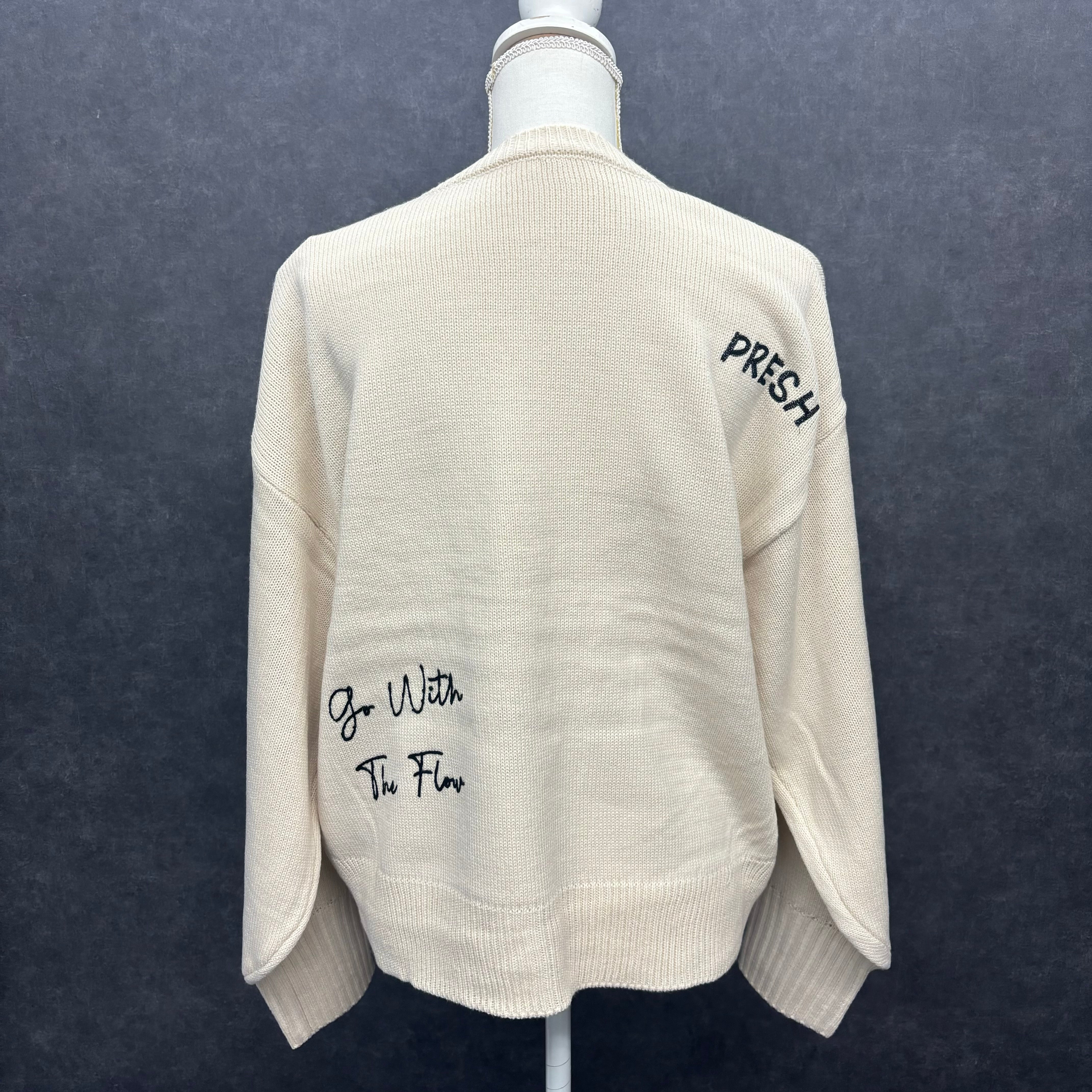 ロゴ刺繍ニットプルオーバー アイボリー *12/24-30頃より順次発送予定